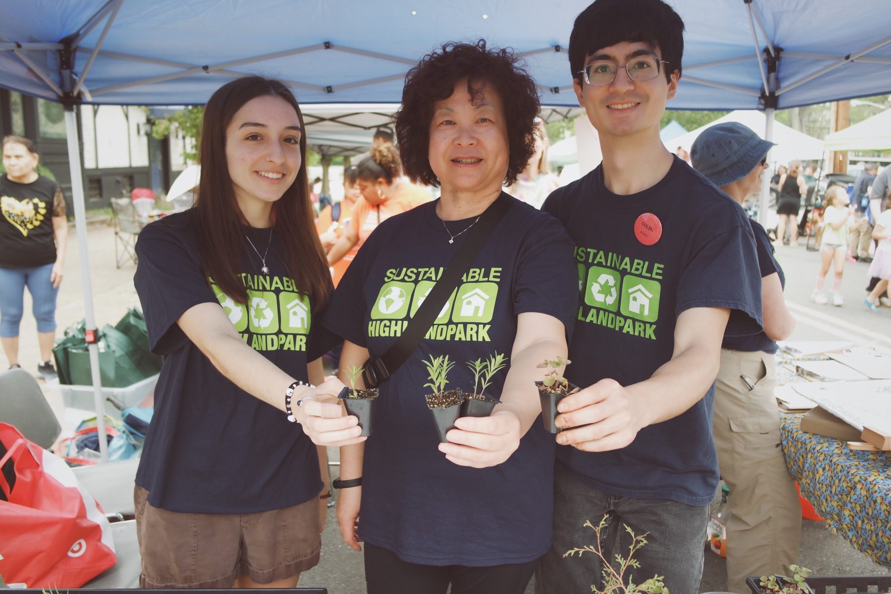 SHP team holding plants