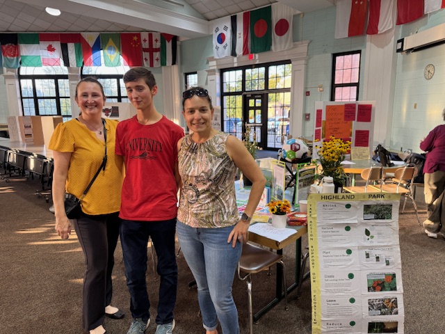 SHP members Meli and Rose with a High School student.